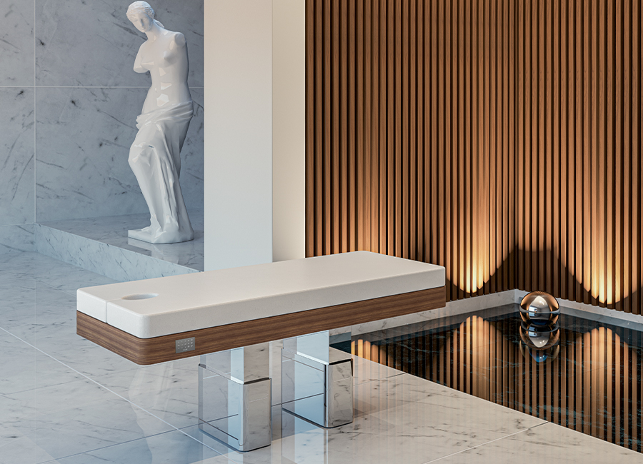 Theia Lettino da massaggio con struttura in noce e acciaio inox lucido.